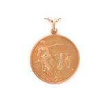 An Argentinian 18k marked yellow metal pendant medallion, depicting a graceful woman with the
