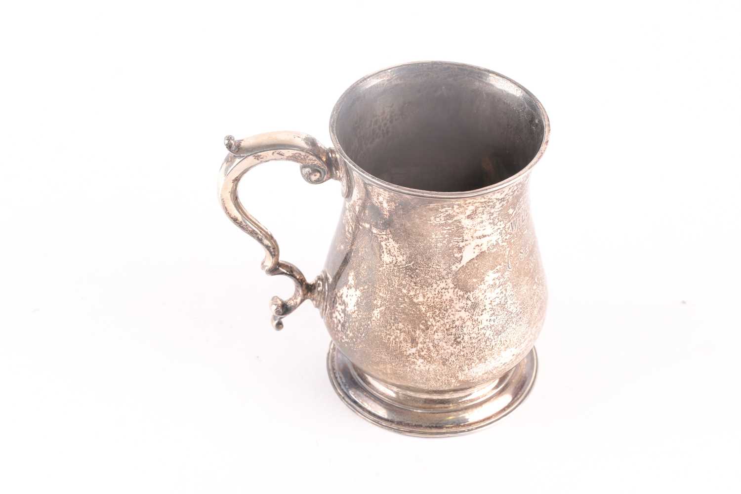 A George III silver baluster tankard with capped double scroll handle. London 1761 by William and - Image 5 of 5