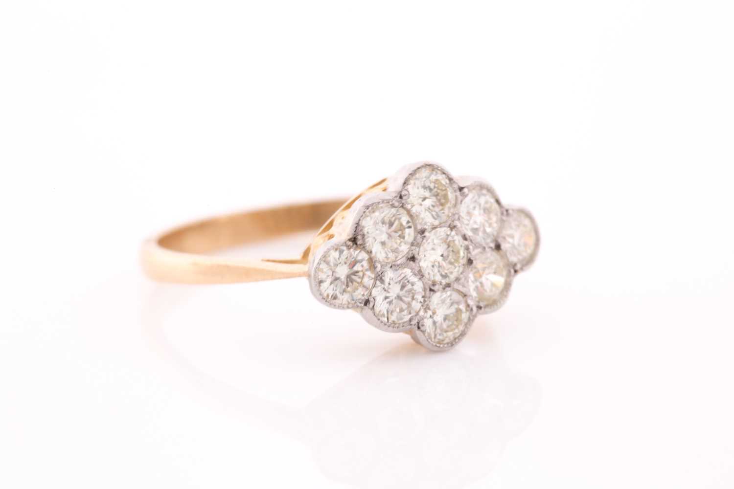 An 18ct yellow gold and diamond ring, set with a cluster of nine round brilliant-cut diamonds of - Image 3 of 4