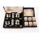 A set of six Victorian cased silver napkin rings. Chester 1899 maker not found. With frilled