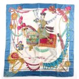 Hermes, Paris. A silk scarf depicting Italian theatrical figures including Colombine, Crispin, and