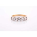 An 18ct yellow gold and diamond ring, set with five round brilliant-cut diamonds of approximately