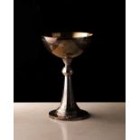 A Georg Jensen silver ecclesiastical chalice. bearing import marks for London 1929. With memorial