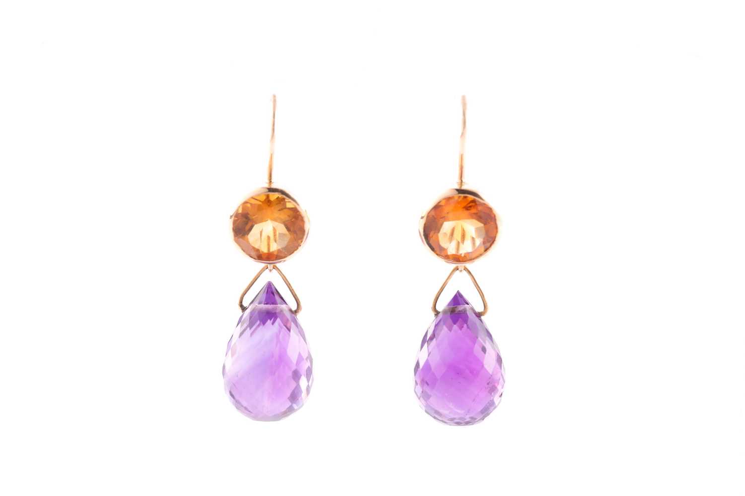 A pair of amethyst and citrine pendant earrings, the faceted pear shaped amythests suspended from