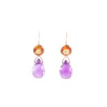 A pair of amethyst and citrine pendant earrings, the faceted pear shaped amythests suspended from