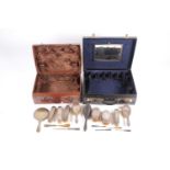 A 1930s matching but mixed date silver dressing table appointment set with engine turned decoration.