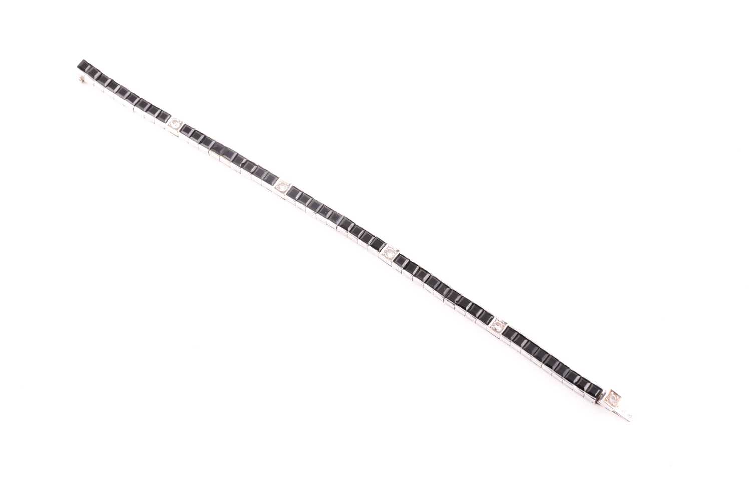 An 18ct white gold, diamond, and onyx line bracelet, the segments set with square-cut black onyx, - Image 3 of 6