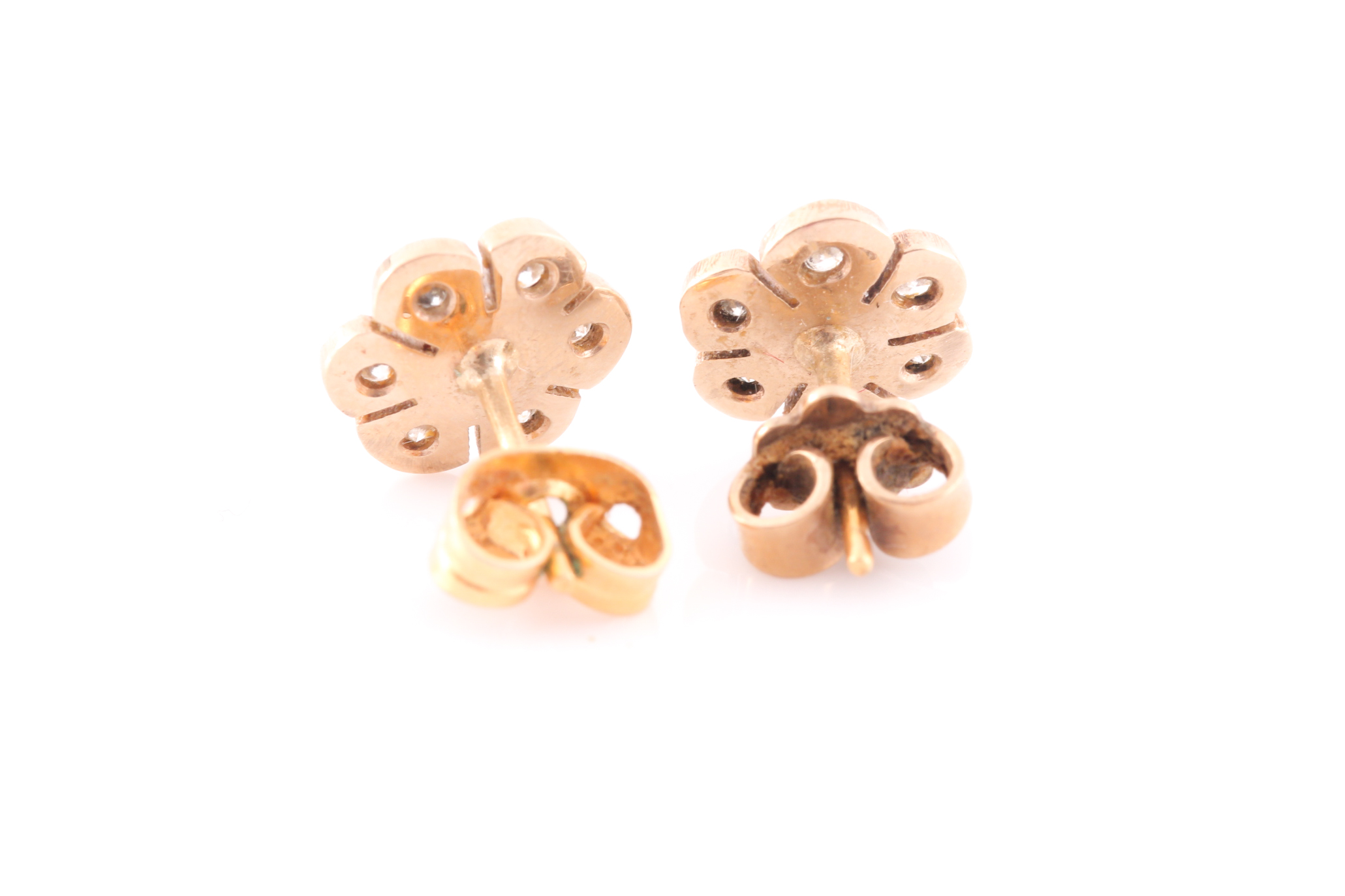 A pair of yellow metal and diamond floral cluster ear studs, together with a yellow metal and - Image 3 of 3