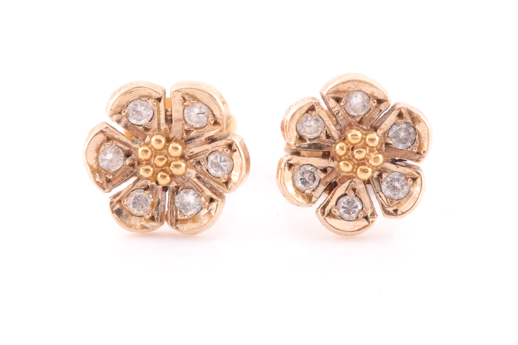 A pair of yellow metal and diamond floral cluster ear studs, together with a yellow metal and