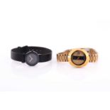 A gilt metal Rado wristwatch with paste gem set gilt and black dial, on an articulated link strap,