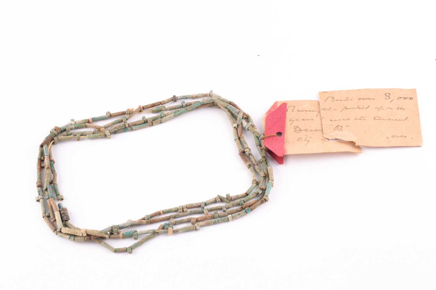 An Egyptian style mummy bead necklace, possibly restrung, comprising vari-shape turquoise-coloured