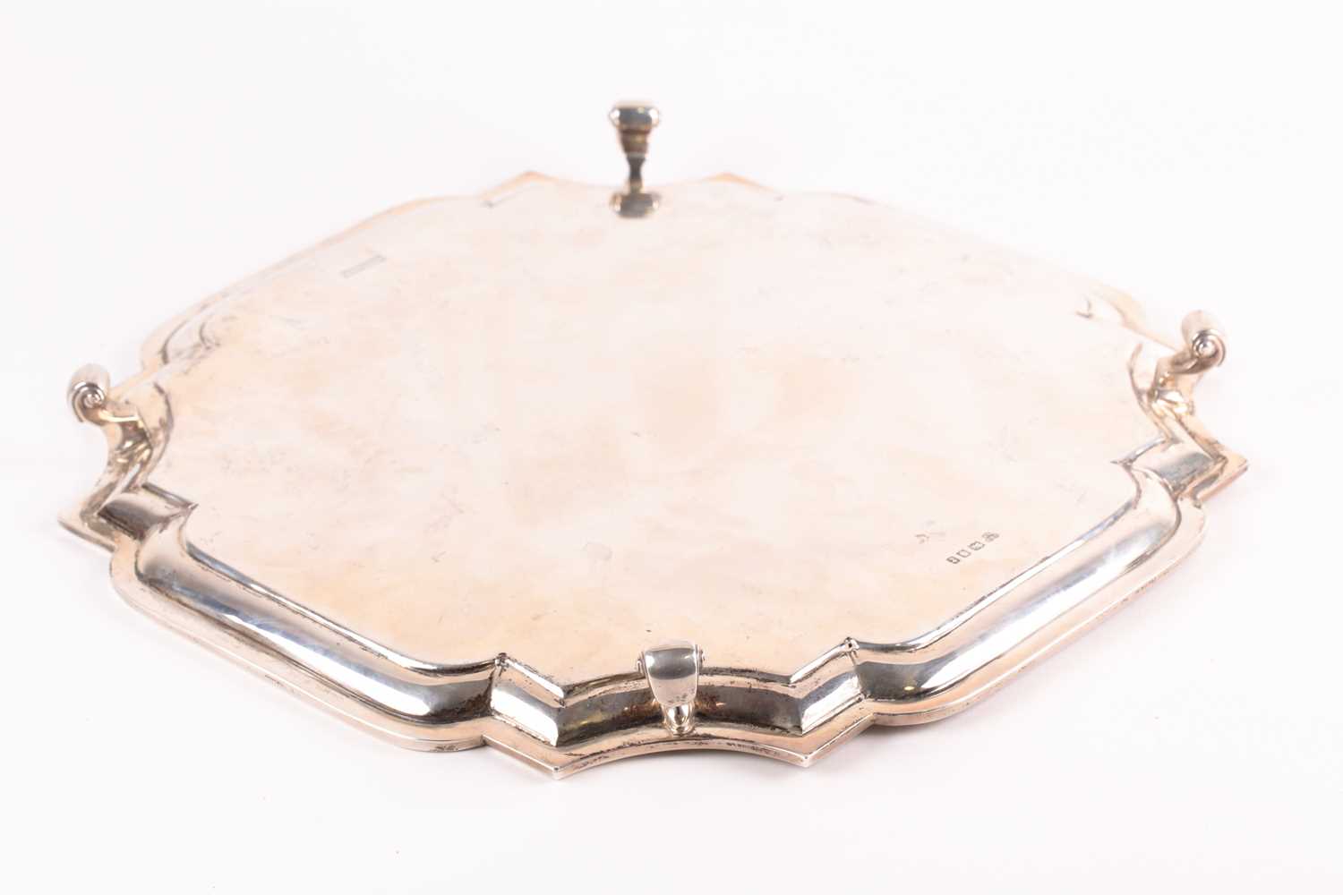 A George V silver salver, London 1920 by Z Barraclough & Sons, of shaped, square form on four scroll - Bild 2 aus 4