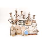 A mixed group of silver-backed dressing table brushes, to include one with guilloché enamel back,