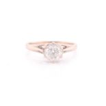A solitaire diamond ring, set with a round brilliant-cut diamond, of approximately 0.90- 1.00