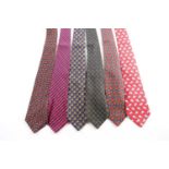 A group of seven Chanel ties, in various designs and colours. (7)
