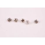 A group of five round brilliant-cut diamonds, showing slight colour, approximately 1.12 carats