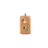 An unusual yellow metal and gemstone ingot pendant, set with a Credit Suisse ingot, numbered 464091,