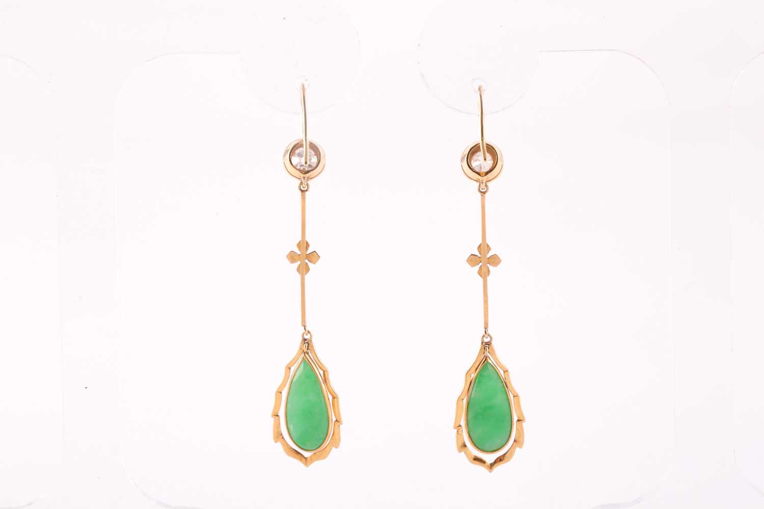 A pair of diamond and jade pendant earrings, each set with a pear-shaped jade plaque, bar-set with - Image 2 of 2