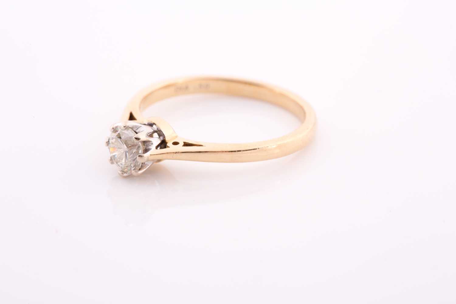 An 18ct yellow gold and solitaire diamond ring, set with a round brilliant-cut diamond of - Image 4 of 4
