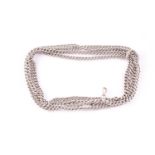 An Edwardian silver curb pattern long chain, marks to each of the uniform links, sprung clip