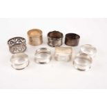 A collection of nine silver napkin rings of mixed design including 1975 Hamilton & Inches. 5.7 ozt