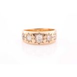 A late Victorian yellow gold and diamond gypsy ring, the star-cut mount inset with five old-cut