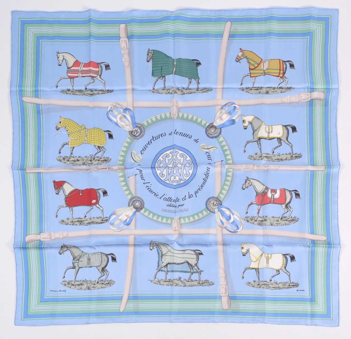 A Hermes silk square scarf printed with the "Guivreries" pattern, together with two other Hermes