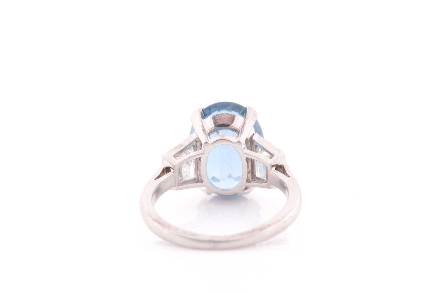 A diamond and blue topaz ring, set with a mixed oval-cut topaz, measuring approximately 12 x 8.5 mm, - Image 2 of 4