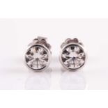 A pair of 18ct white gold and diamond ear studs, collet-set with round brilliant-cut diamonds of