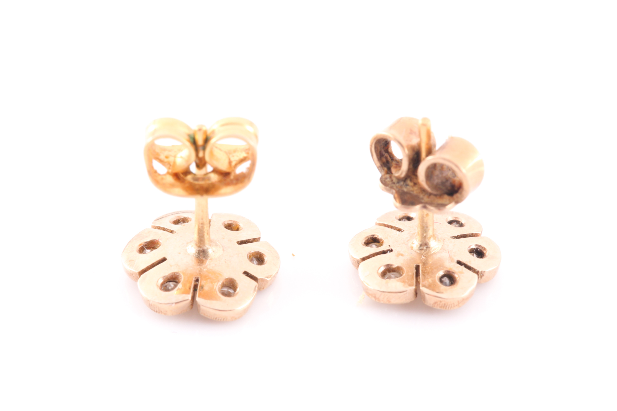 A pair of yellow metal and diamond floral cluster ear studs, together with a yellow metal and - Image 2 of 3