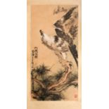 A Chinese hanging scroll, painted with an eagle upon a gnarled pine branch, with three red chop