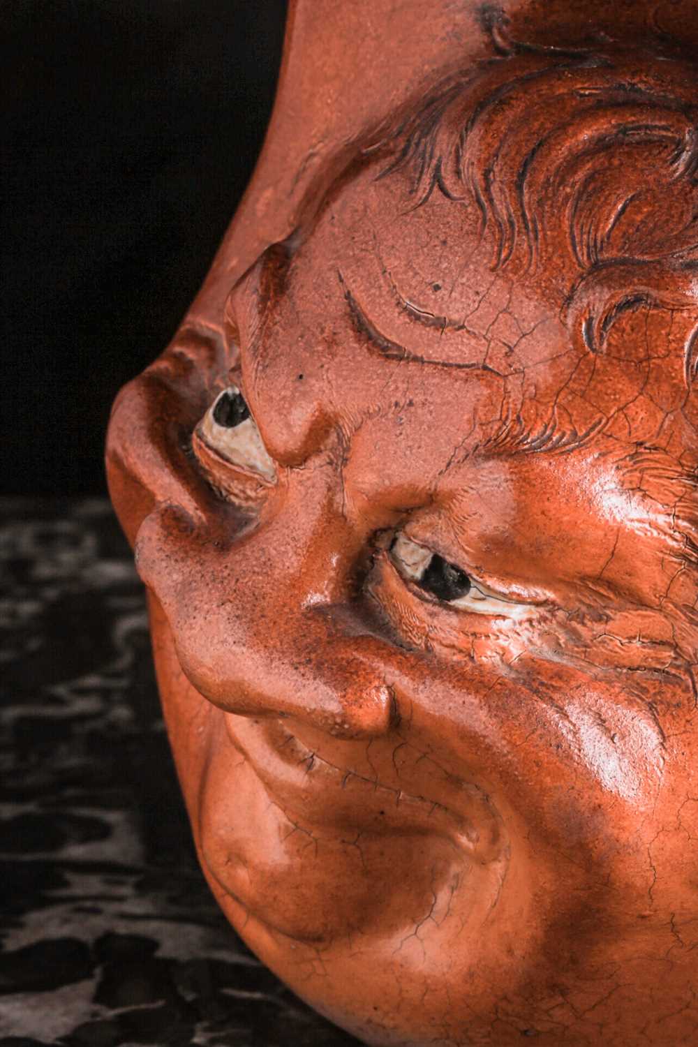 A Martin Brothers large double-sided stoneware face jug, dated 1899, modelled in relief to both - Image 11 of 15