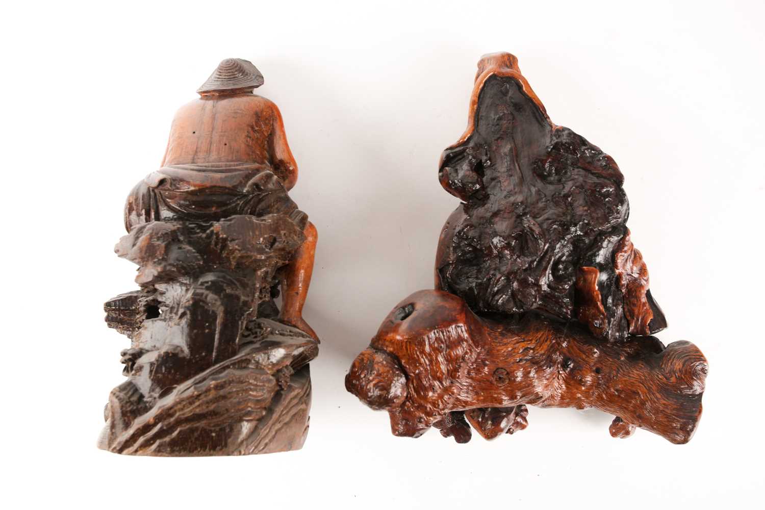 A Chinese root carving of a drunken scholar, Qing, 19th century, carved holding a cup whilst resting - Image 3 of 5