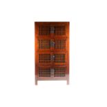A Chinese elm standing corner food cupboard with four pairs of lattice cupboard doors with rustic