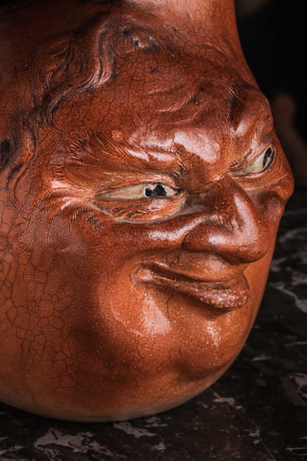 A Martin Brothers large double-sided stoneware face jug, dated 1899, modelled in relief to both - Image 13 of 15