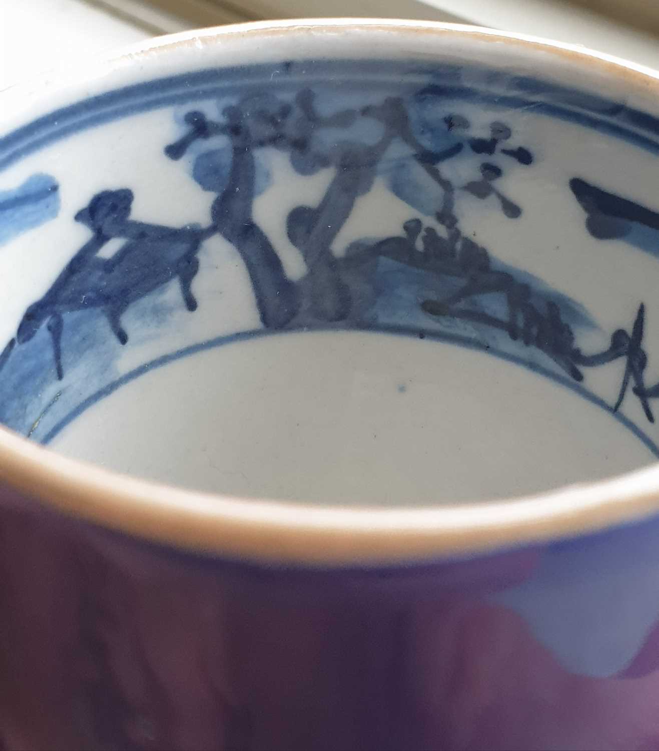 A Chinese blue & white saucer, Kangxi, early 18th century, painted with a boy holding aloft a - Image 8 of 16