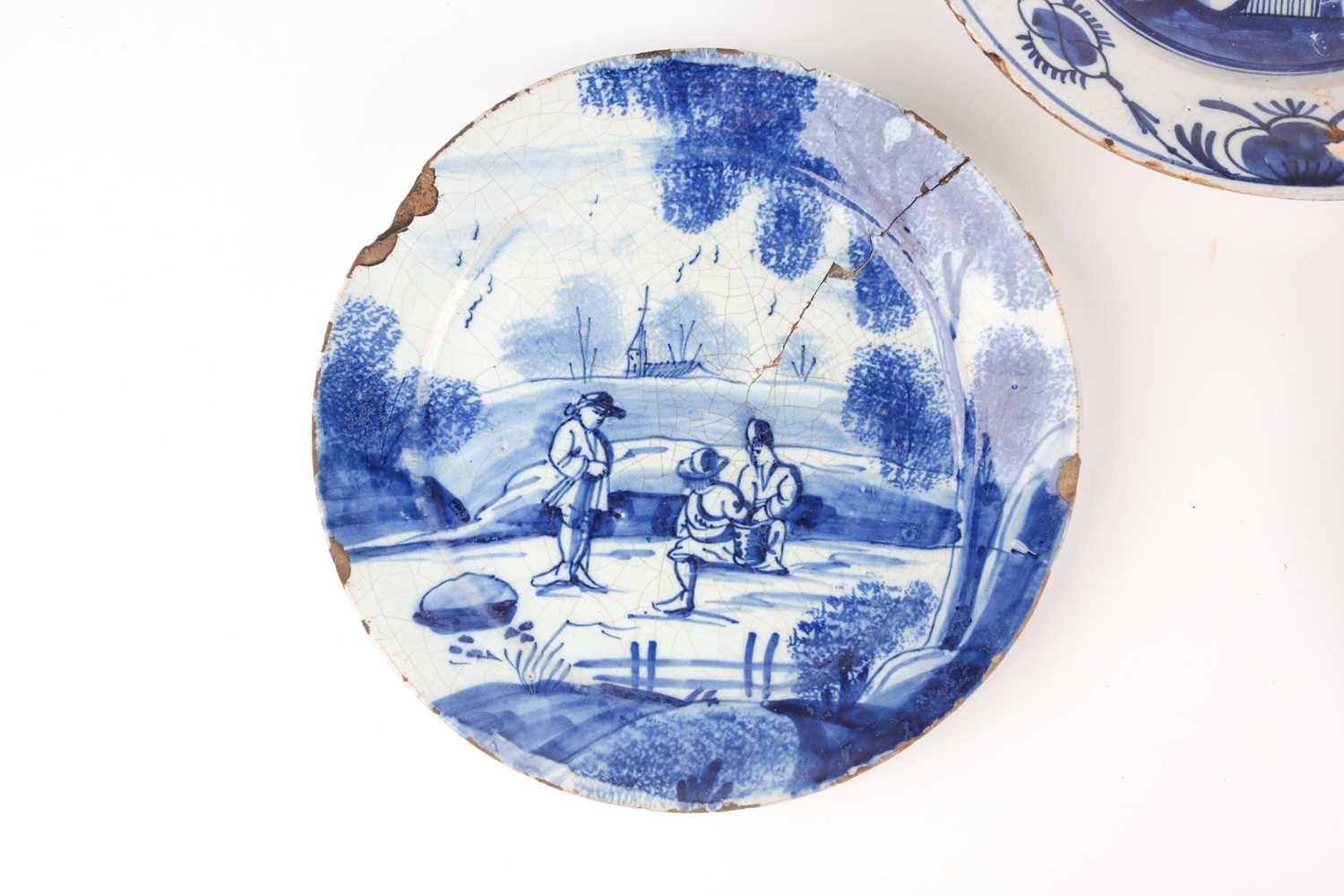 An 18th century delftware bowl and three plates, the bowl and a plate similarly decorated, painted - Image 6 of 7