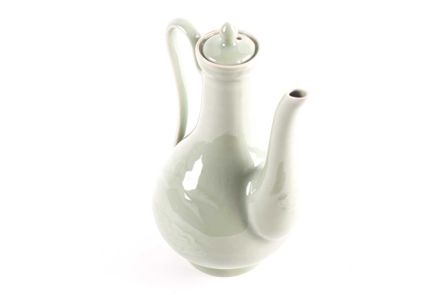 A Chinese celadon wine ewer, modelled in the Persian style, the long stopper with ball knop, moulded - Image 3 of 15