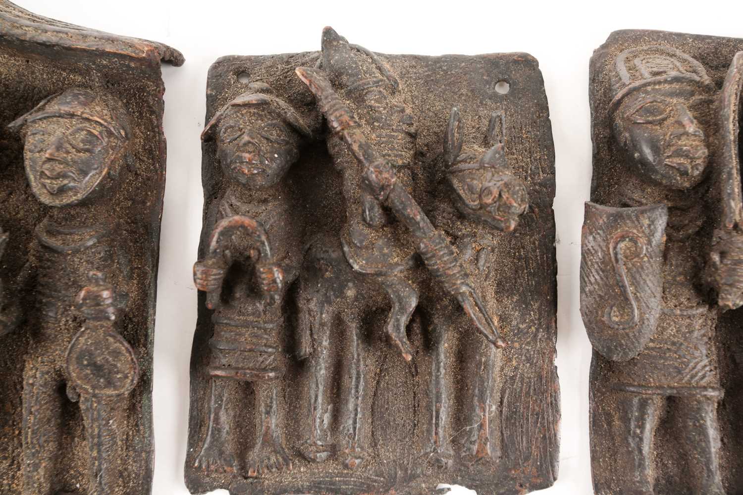Three Benin bronze plaques, Nigeria, comprising an equestrian warrior and attendant, a group of - Image 5 of 5