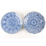 A pair of Chinese blue & white chargers, Kangxi, early 18th century, painted with radiating panels