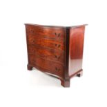 A George III style mahogany serpentine fronted media unit. with faux drawers. Supported on shaped