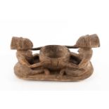 A Luba divination bowl, Democratic Republic of Congo, a seated male and female facing one another