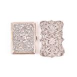 An Indian filigree white metal card case and a Tibetan white metal cheroot case, each with floral