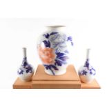 A garniture of three Fukagawa vases, the largest decorated with Peony in blossom with gilt veins,