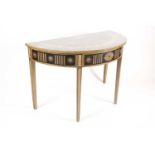 A Sheraton style pale green and black painted demi lune side table. With trompe l'oeil faux inlaid