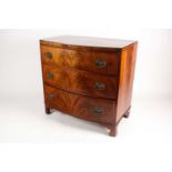 A reconfigured 19th-century mahogany caddy topped bowfront chest of three long drawers. Supported on