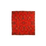 A 20th-century rectangular red ground Kashmiri wall hanging with needlework palmated flowering