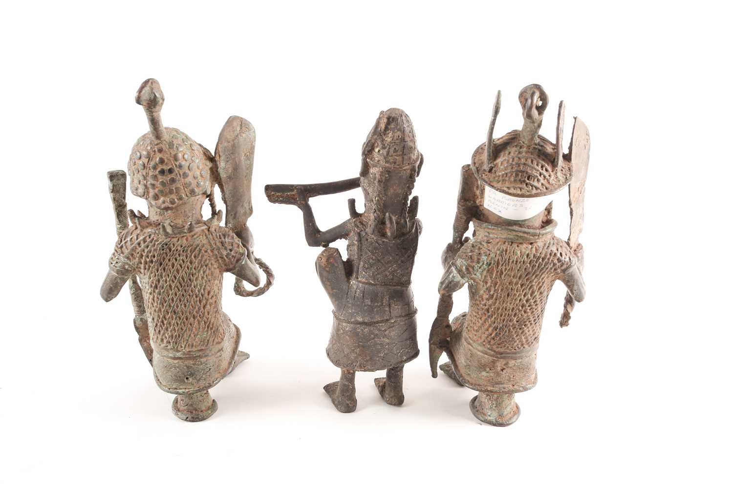 A pair near of Benin bronze seated warriors, Nigeria, each holding a sword and spear, 29.5cm & 30cm; - Image 5 of 7