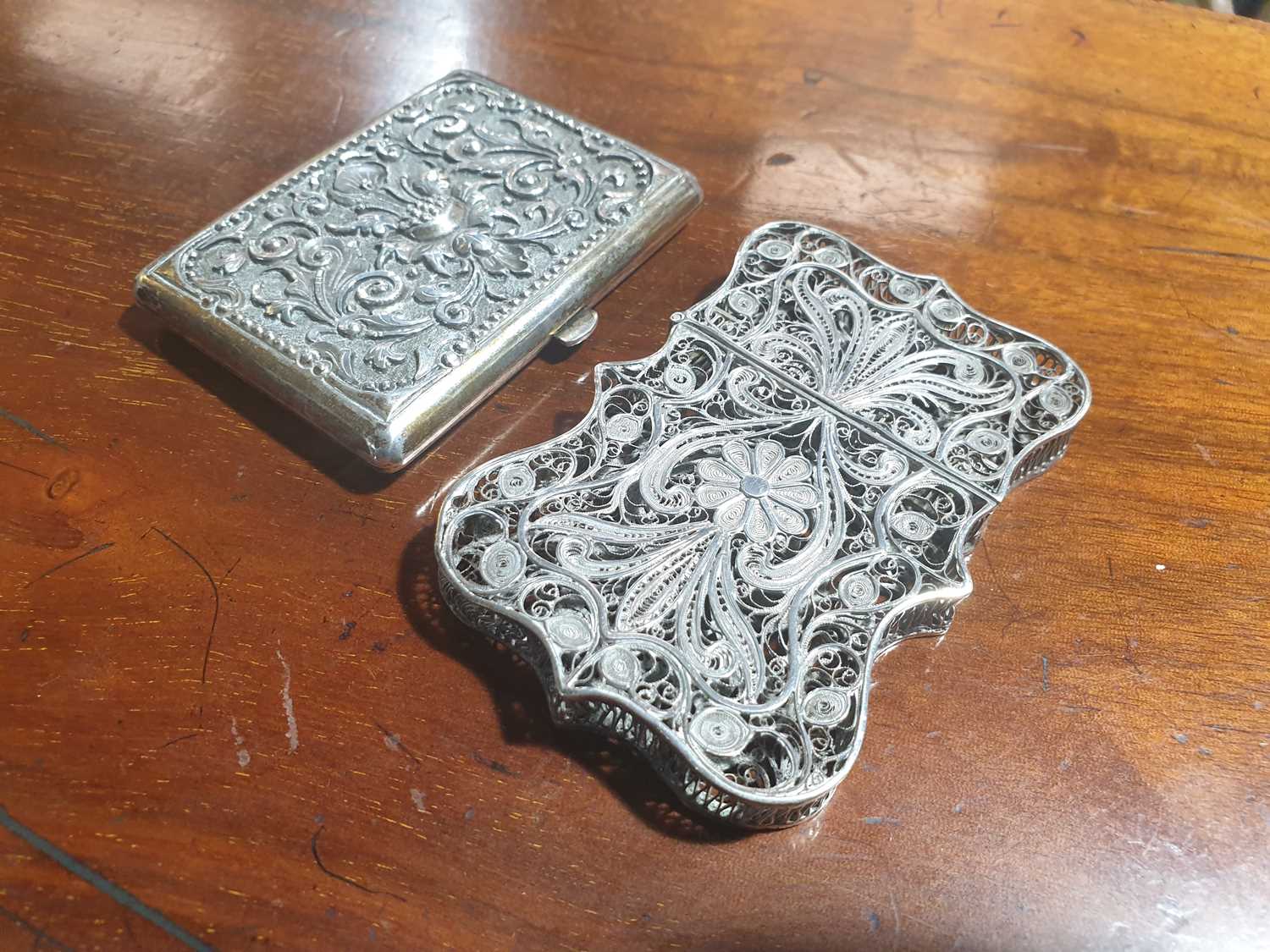 An Indian filigree white metal card case and a Tibetan white metal cheroot case, each with floral - Image 17 of 18