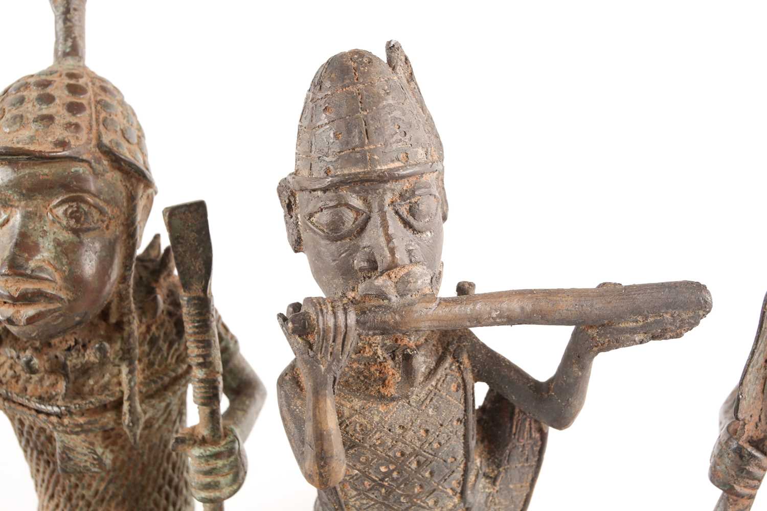 A pair near of Benin bronze seated warriors, Nigeria, each holding a sword and spear, 29.5cm & 30cm; - Image 2 of 7